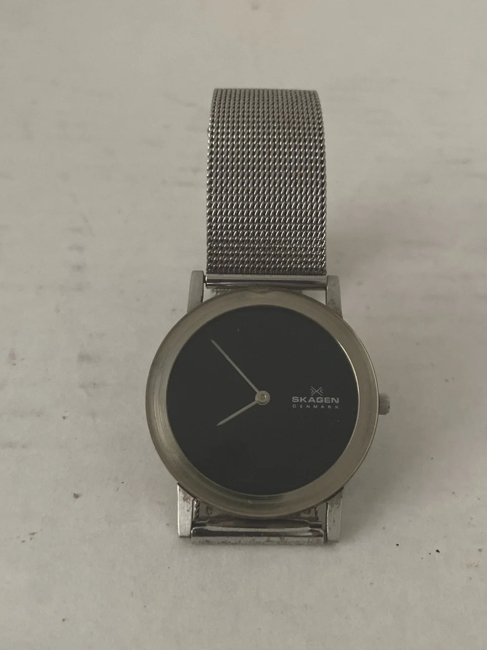 Skagen Modern Unisex Silver Mesh Watch with Black Dial.